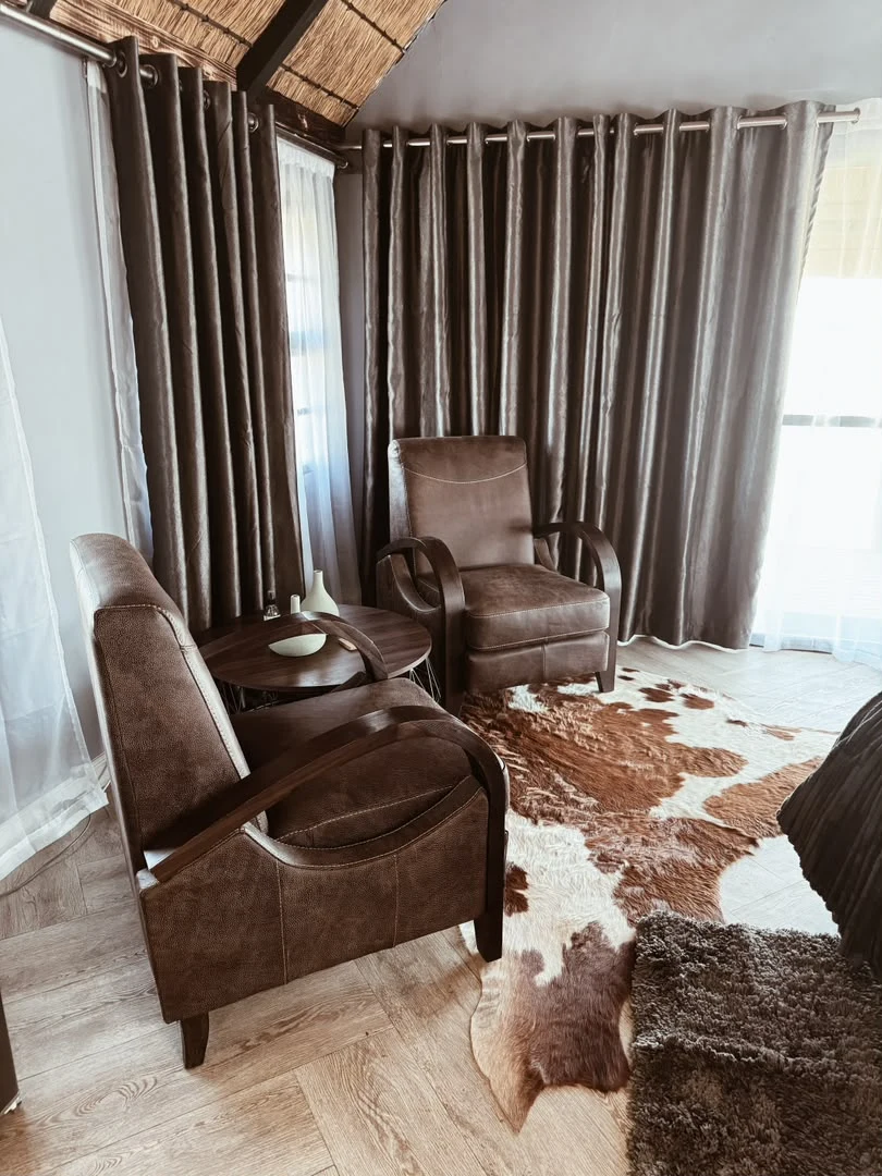 Lounge seating inside the luxury room