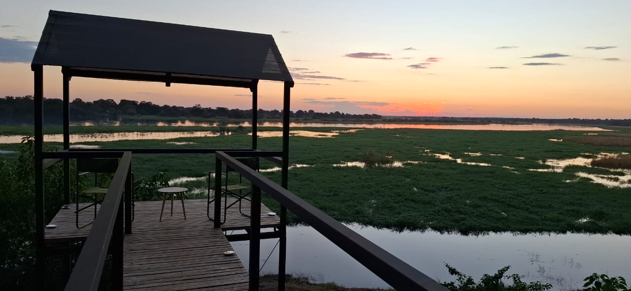 Viewing deck over the river floodplain at sunset